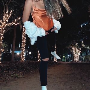 BLACK RIPPED JEANS & BURNT ORANGE BLOUSE (both)